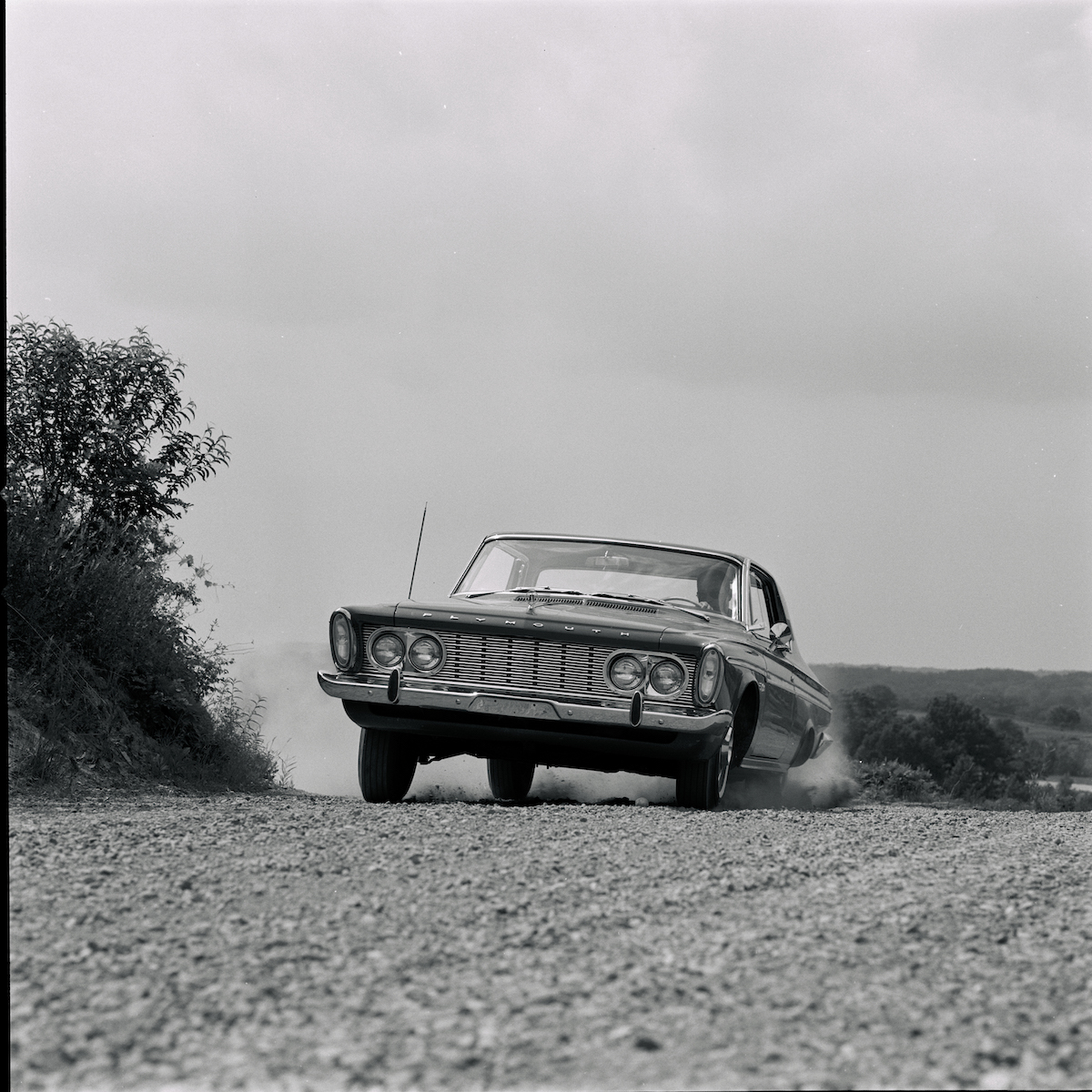 A 1963 Plymouth Fury driving