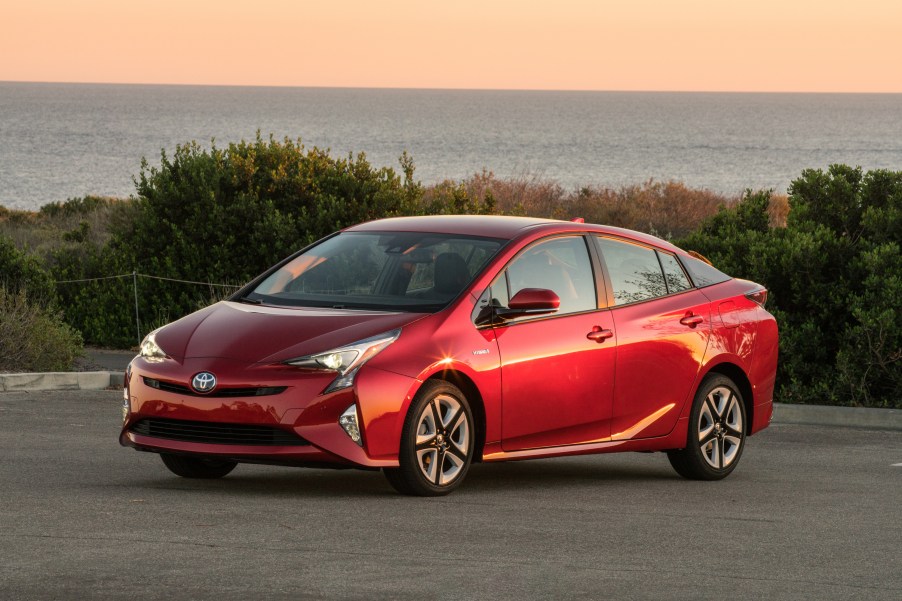 a red 2016 Toyota Prius parked