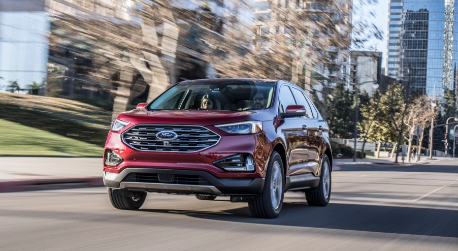 Ford Edge driving down country road