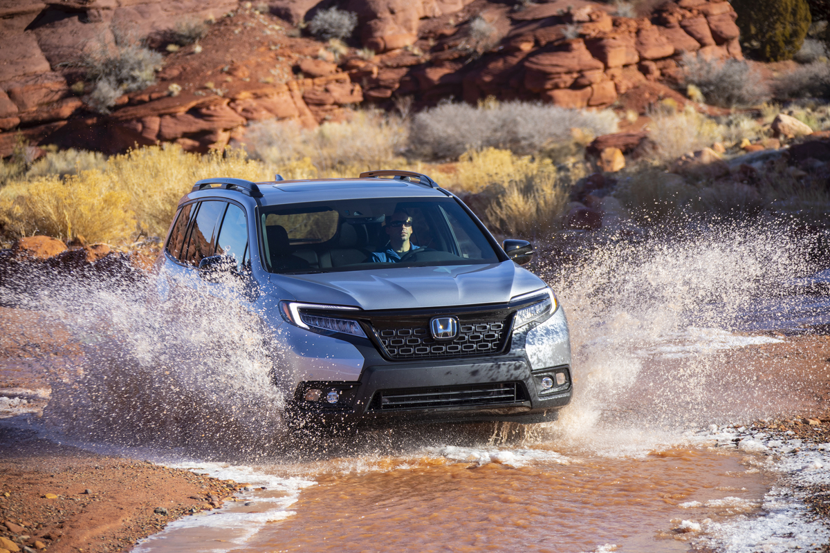 when he's not racing IndyCar, Rossi drives a gray Honda Passport like this one
