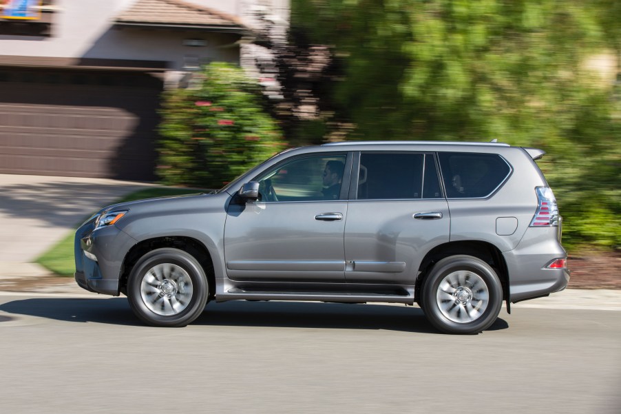 a gray 2019 Lexus gx luxury SUV driving through the neighborhoodl