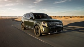 2020 Kia Telluride driving down paved road