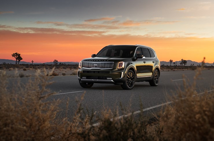 2020 Telluride driving on road at dusk