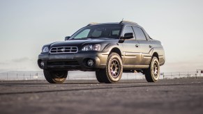 a Subaru Baja ute pickup truckparked on the pavement