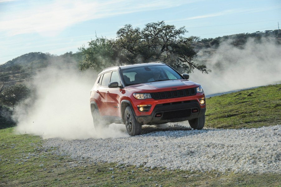 2019 Jeep Compass driving through sand