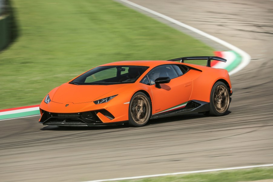 Orange Lamborghini huracan on a track