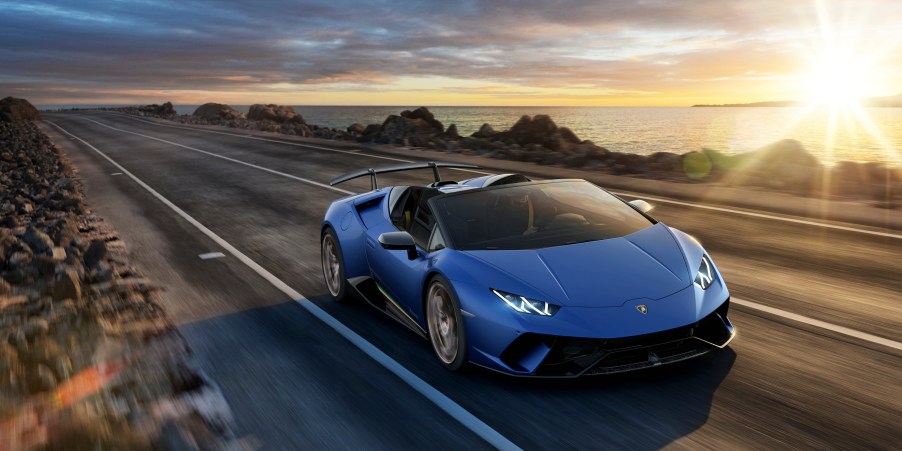 Lamborghini Huracan Performante Spyder driving down a coastal road