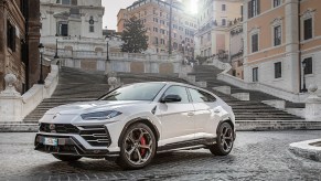 An image of a Lamborghini Urus SUV rolling down the road.