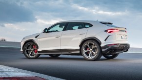 An image of a Lamborghini Urus on track.