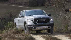 2019 Ram 1500 Rebel driving on dirt road