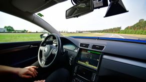 A passenger in a self-driving car.