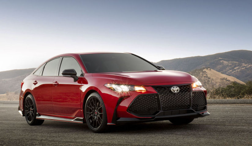 A red 2020 Toyota Avalon TRD out in the country.