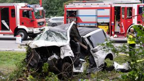 A totaled car on the highway