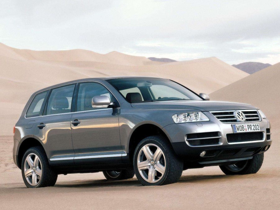 A grey Touareg SUV off-road.