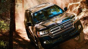 2019 Toyota Land Cruiser off-roading over rocky trail