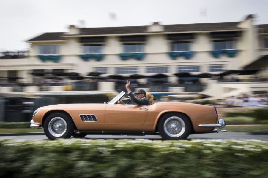 A 1960 Ferrari 250 GT Scaglietti Spyder California is driven onto the winners ramp during the 2019 Pebble Beach Concours d'Elegance in Pebble Beach, California