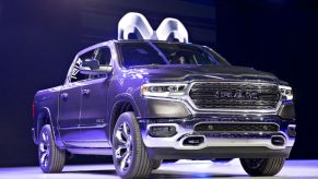 A 2019 Dodge Ram pickup truck on display at an auto event.