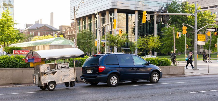 Car towing trailer