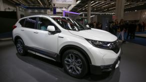 The Japanese car manufacturer Honda displays the Honda CR-V Hybrid compact crossover SUV