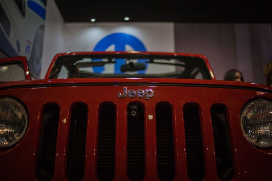 The Jeep truck logo on display at the International Motor Show Bogota