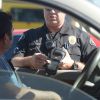 Police officer issues a speeding ticket