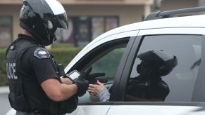 A police officer writes a citation