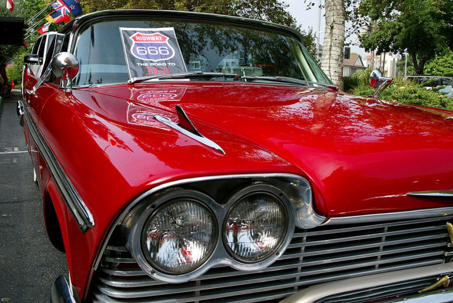 Close up of a red classic car that was featured in a movie about the deadliest car in America