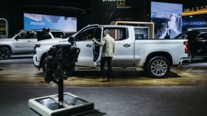 An attendee views the GM Chevrolet 2020 Silverado HD High Country truck