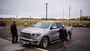 Dodge Ram is inspected in a parking lot