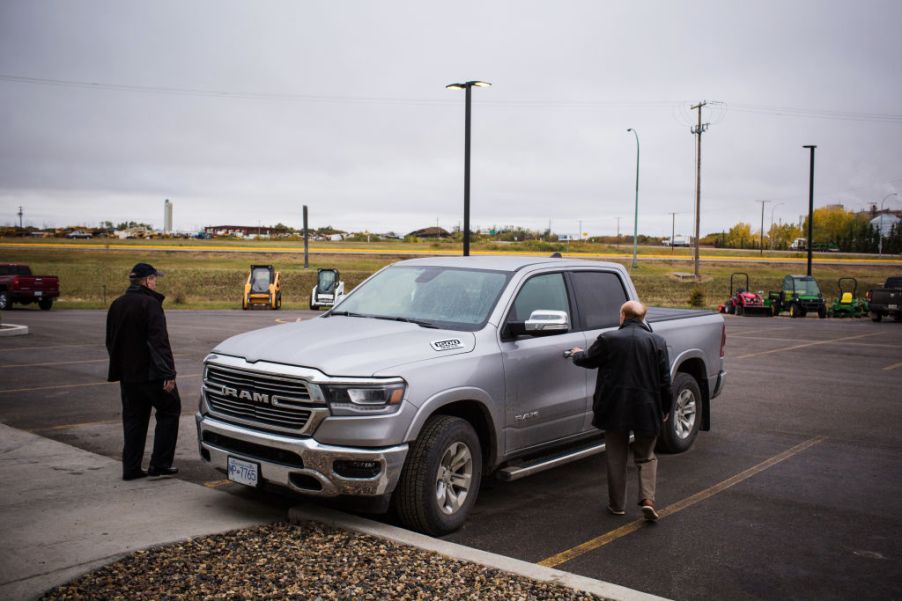 Dodge Ram is inspected in a parking lot