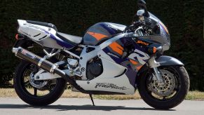 A Honda Fireblade motorcycle parked on the street.