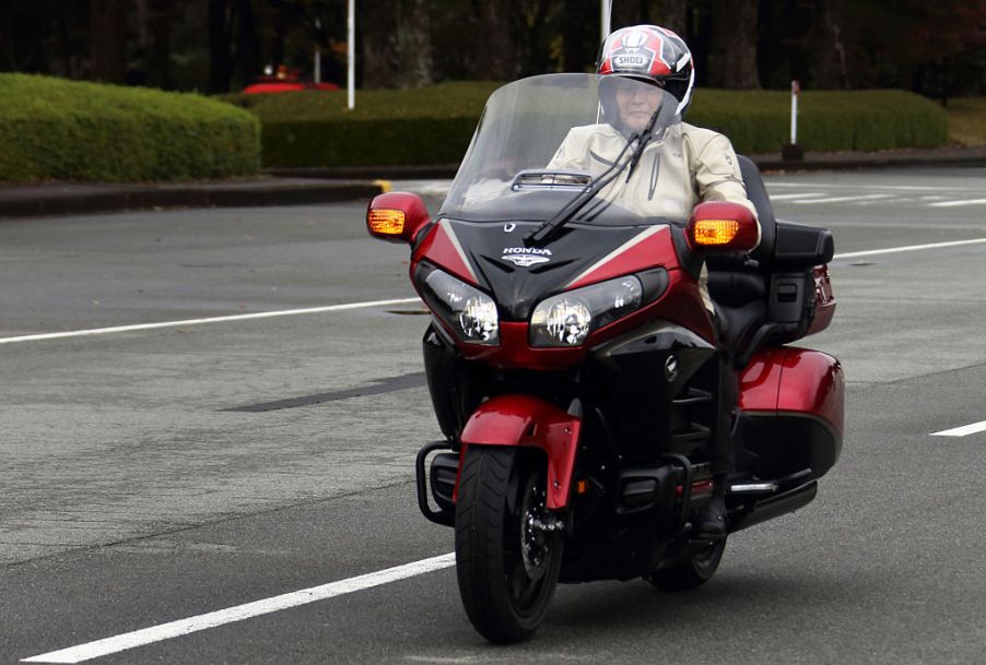 A man riding a Honda Gold Wing touring motorcycle