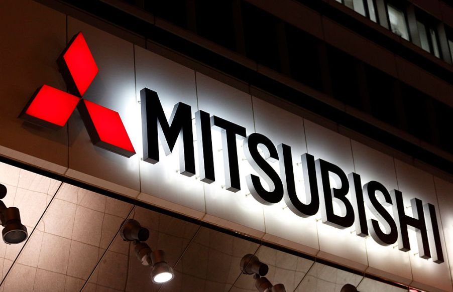 An illuminated Mitsubishi sign