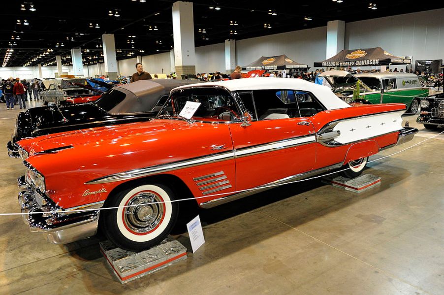 A red 1958 Pontiac Bonneville on display.