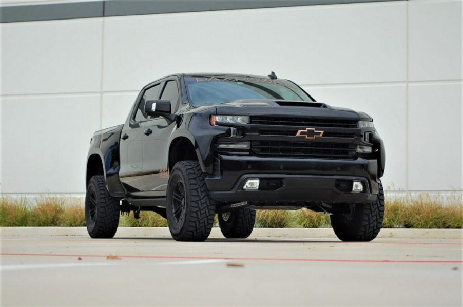 Chevy Silverado Jackal Stage 2 parked near building