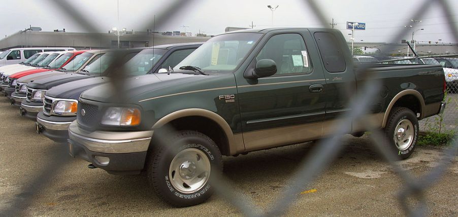 New Ford F-150 pickups are parked at a dealership in Illinois