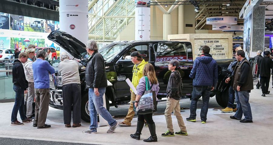 Autoshow patrons check out the $83,068 2015 Ram 3500 Laramie Longhorn Crew Cab at the 2015 edition