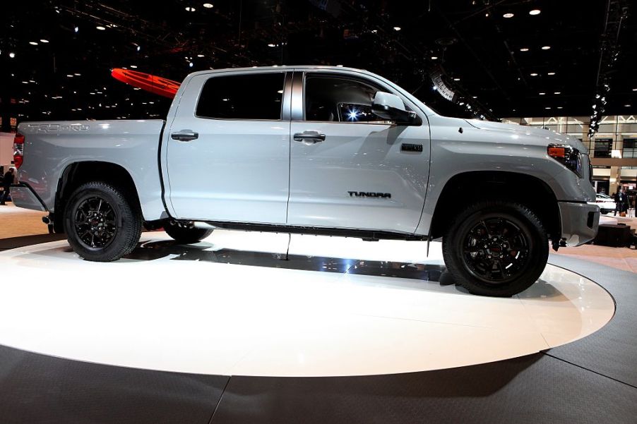 A dependable 2016 Toyota Tundra pickup truck on display at an auto show.