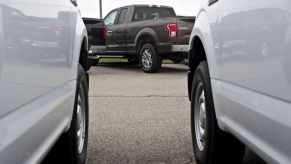 2017 Ford F-150 pickup trucks sit on display