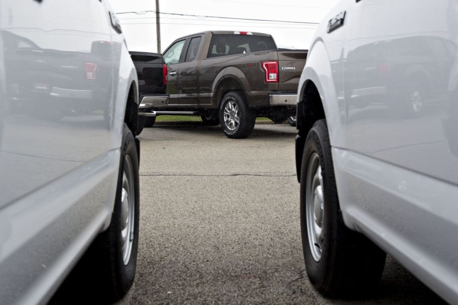 2017 Ford F-150 pickup trucks sit on display