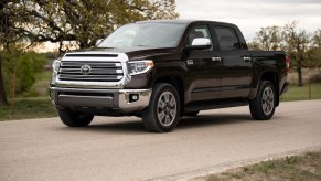 The 2019 Toyota Tundra drives on a country road