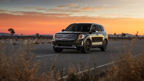 2020 Kia Telluride driving at dusk