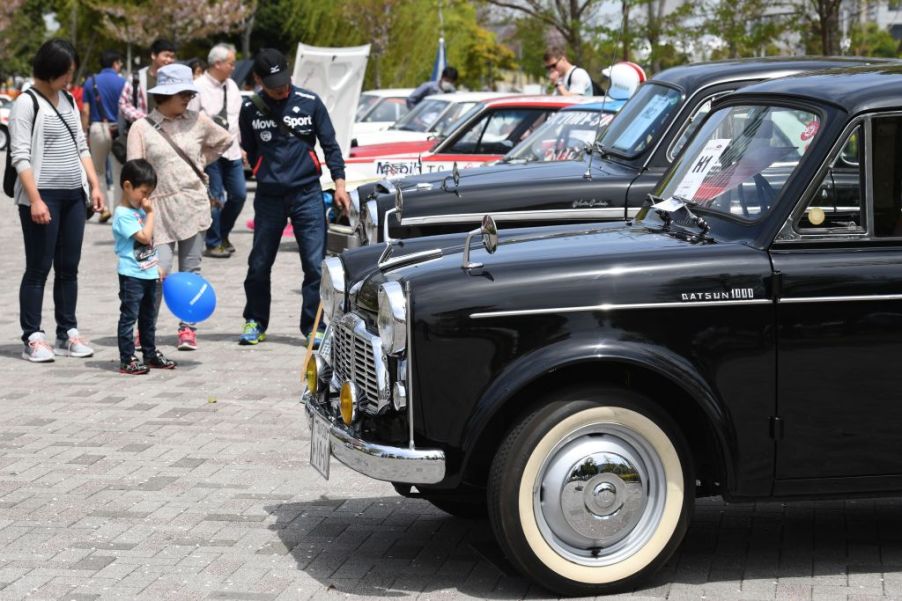 A 1959 Datsun 1000 sedan is displayed during the Motor Sport Japan 2017