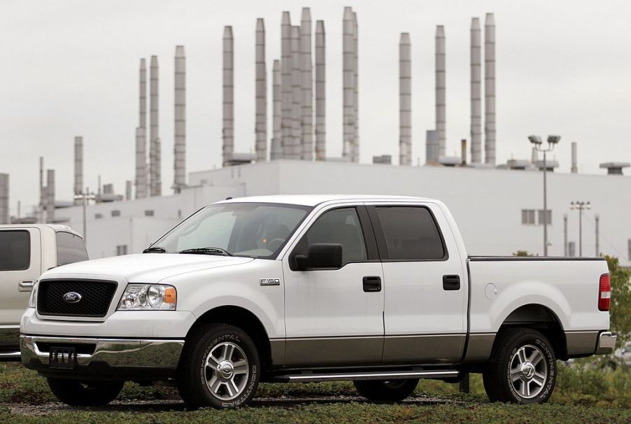 A white Ford F-150 Crew Cab truck on display.