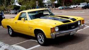 A Chevy El Camino parked in a lot.