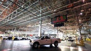 A Ford F-150 truck sitting in a warehouse.