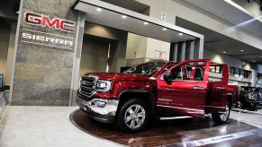 A GMC Sierra on display at an auto show.