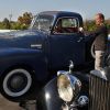 An employee of Auctioneer Bonhams and Butterfields, looks at the 1949 Chevrolet 3100 pick-up truck that was owned by actor Steve McQueen and is on display at the upcoming "Classic California" car and bike auction in Los Angeles on November 13, 2009. AFP PHOTO/Mark RALSTON (Photo credit should read MARK RALSTON/AFP via Getty Images)