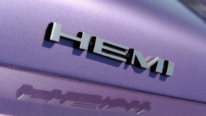 A HEMI logo on the side of a car.