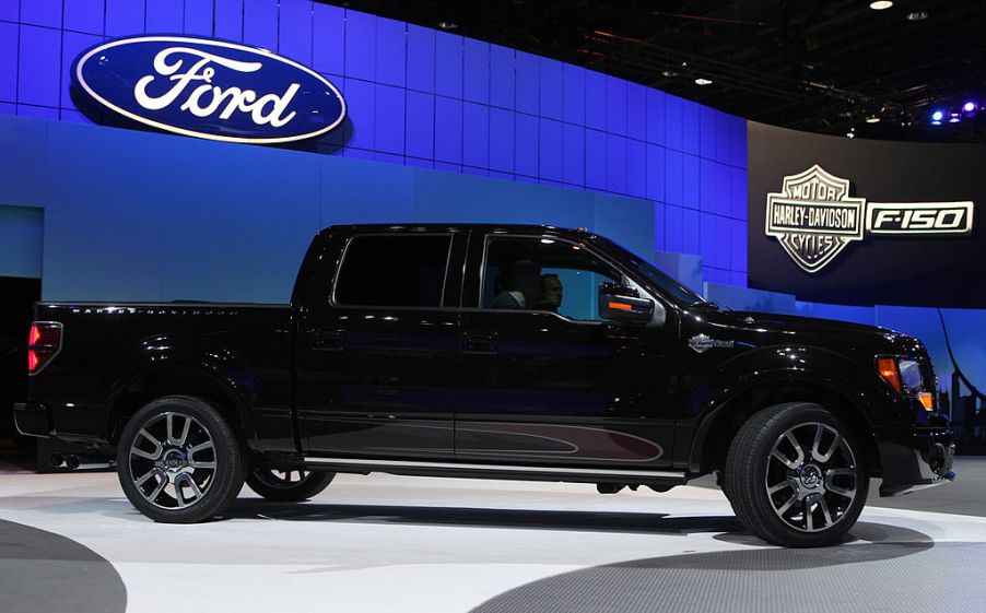 A Harley Davidson Ford F-150 on display at an auto show.